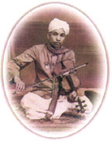 Parur Sundaram Iyer seated with violin
